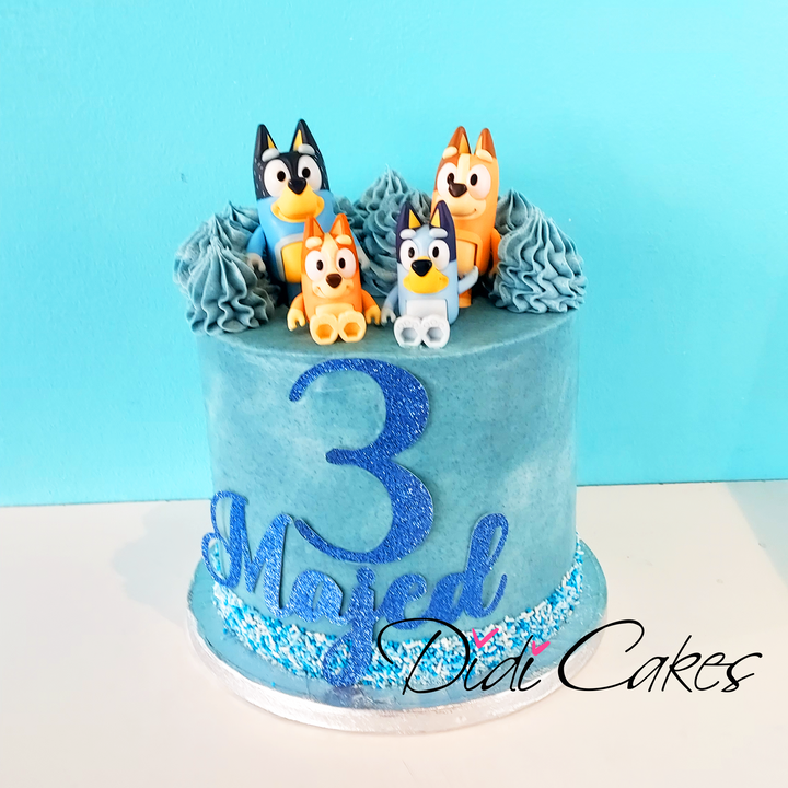 Bluey Figures on Cake