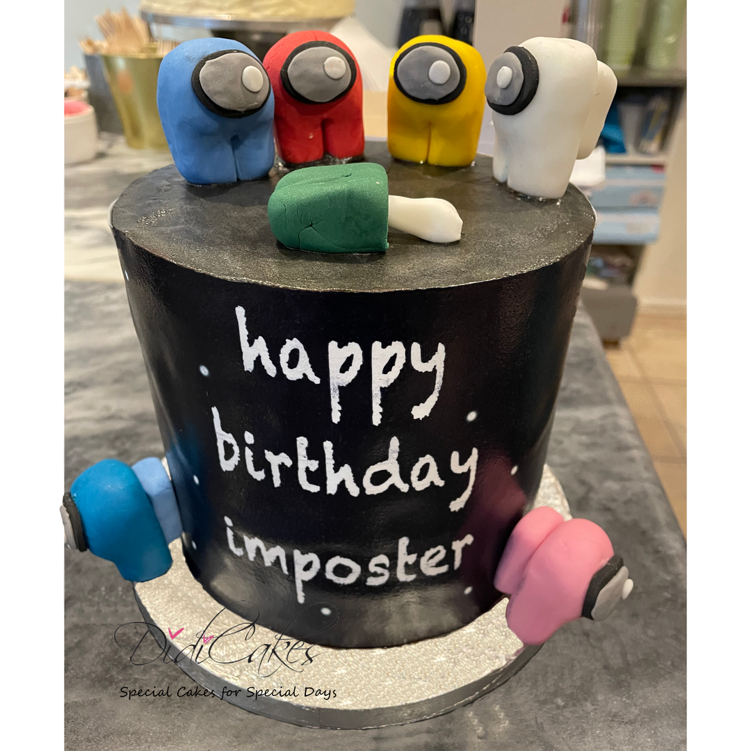A themed birthday cake decorated with characters and text from the game Among Us, with a black base and colorful decorations.