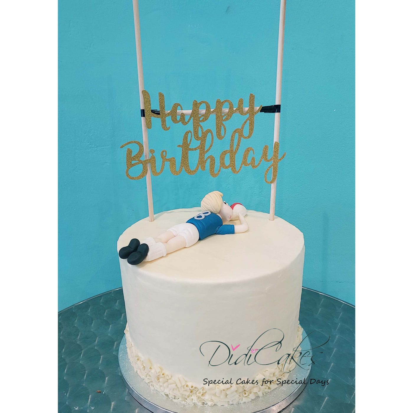 Trendy tall cake with swirls and topper